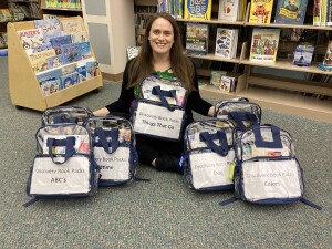 Katie with Discovery Book Packs Jan 2021